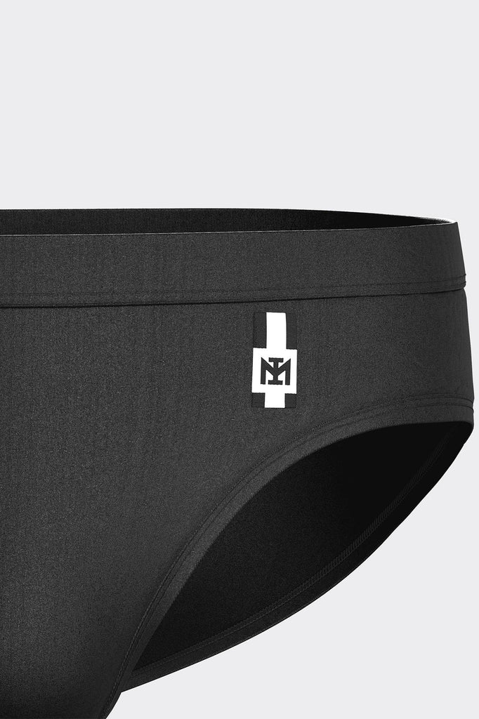 Impetus Swim Slip Cayo in Schwarz aus einer Polyamid- Elasthanmischung